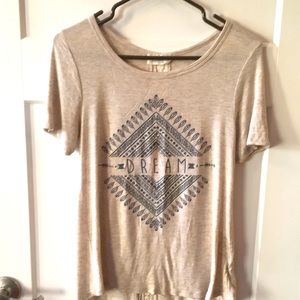 Moonchild Heather’s tan T-shirt